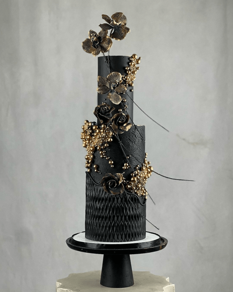 black and gold cake by spring.bloom .cakes